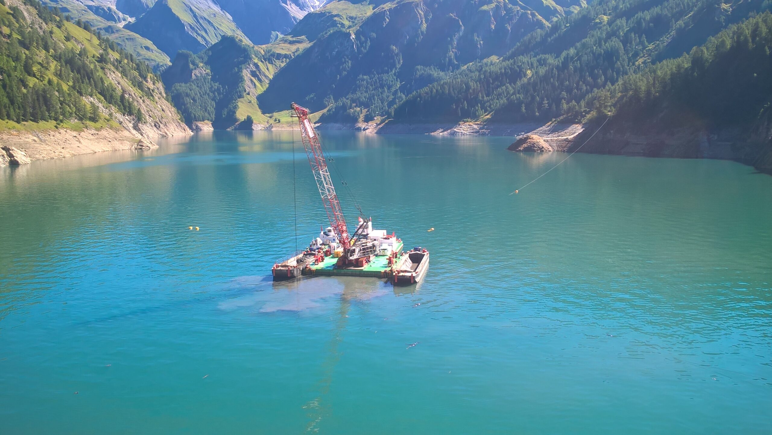 modular barge in lake with crane